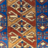 Noshirwan – Hand Knotted Wool Rug in Blue/Rust