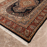 Turanbaz – Hand Knotted Wool Rug in Navy Blue/Rust