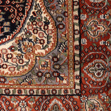 Turanbaz – Hand Knotted Wool Rug in Navy Blue/Rust
