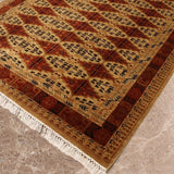 Gul-e-Wustaana – Hand Knotted Wool Rug in Rust/Brown