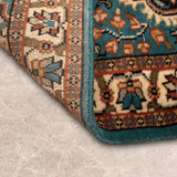 Kohsafar – Hand Knotted Wool Rug in Turquoise Blue/Cream