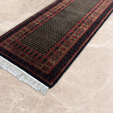 Khoruzi – Hand Knotted Wool Rug in Black/Brown