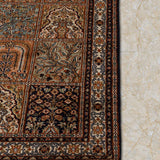 Neelhar Grid – Hand Knotted Silk Rug in Navy Blue/Peach