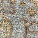 Mehraan – Hand Knotted Wool Rug in Light Blue/Pink