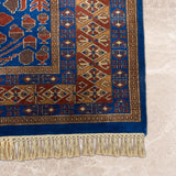 Noshirwan – Hand Knotted Wool Rug in Blue/Rust