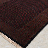 Zarrukh – Hand Knotted Wool Rug in Black/Rust