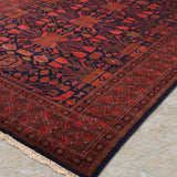 Zorayan – Hand Knotted Wool Rug in Ink Blue/Orange Rust