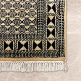 Sarab – Hand Knotted Wool Rug in Cream/Black