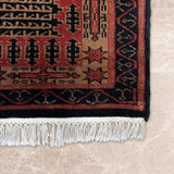 Khoruzi – Hand Knotted Wool Rug in Black/Brown