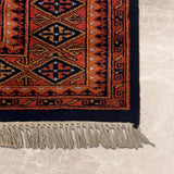 Kohsaran – Hand Knotted Wool Rug in Navy Blue/Rust