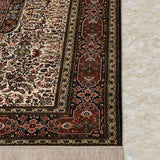 Roshnaz – Hand Knotted Silk Rug in Ivory/Orange Rust