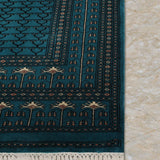 Aivaan – Hand Knotted Wool Rug in Turquoise Blue/Black