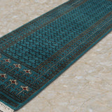 Kohistan – Hand Knotted Wool Rug in Turquoise Blue/Black
