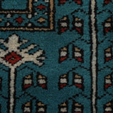 Kohistan – Hand Knotted Wool Rug in Turquoise Blue/Black