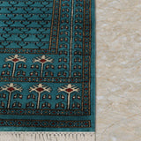 Kohistan – Hand Knotted Wool Rug in Turquoise Blue/Black