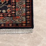 Ravand – Hand Knotted Wool Rug in Black/Russet