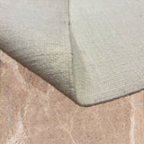 Neer Saaz – Hand Woven Wool Rug in Ivory/Charcoal Grey