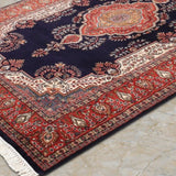 Darbari Rosette – Hand Knotted Wool Rug in Navy Blue/ Rust