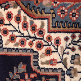 Darbari Rosette – Hand Knotted Wool Rug in Navy Blue/ Rust
