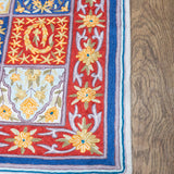 Zarrin - Chain Stitch Embroidery Cotton Rug In Brick Red/Blue