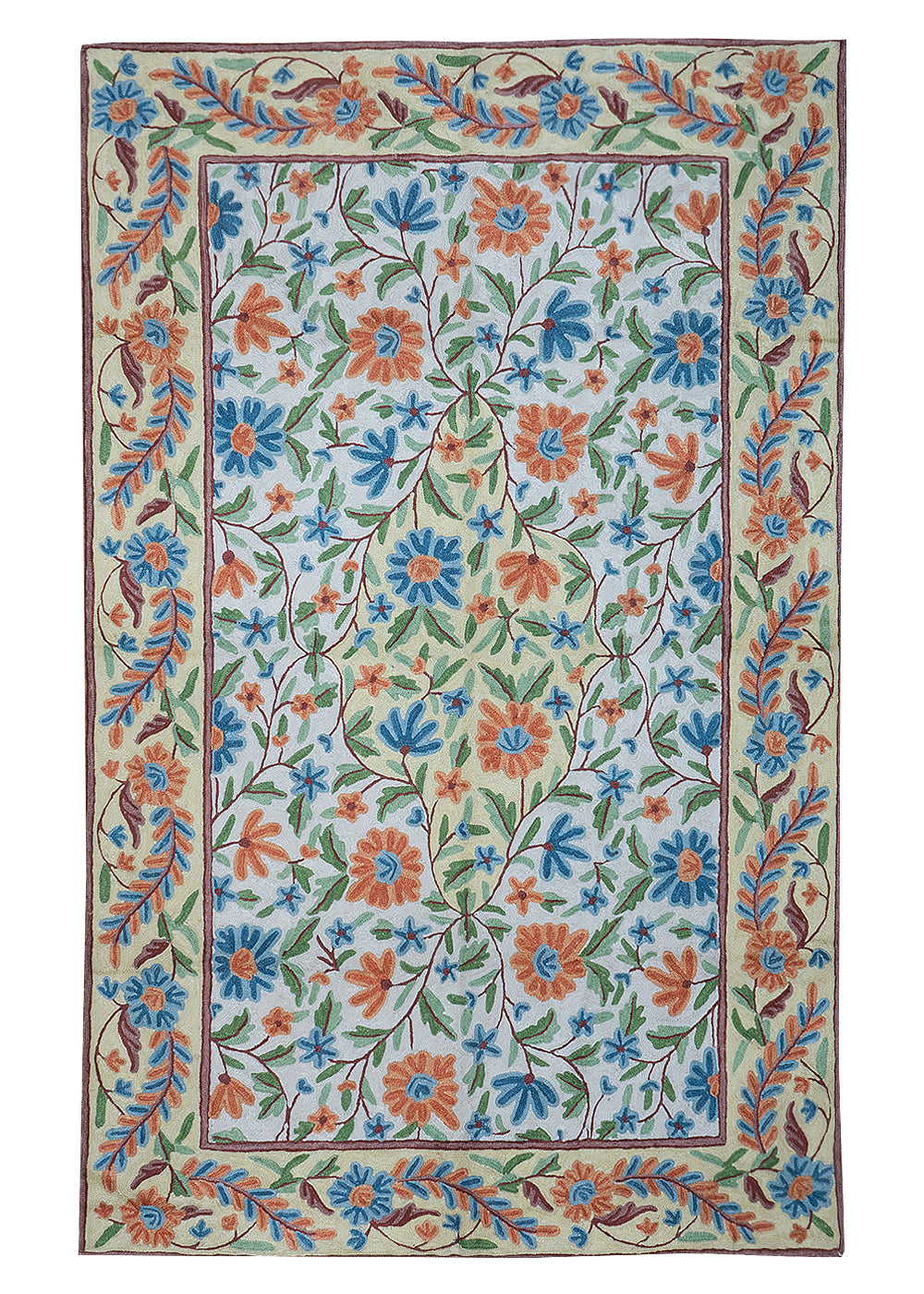 Gulmarg handmade floral rug with chain stitch embroidery in cream and light blue, featuring vibrant orange and blue flowers with green leaves on a soft cotton base.