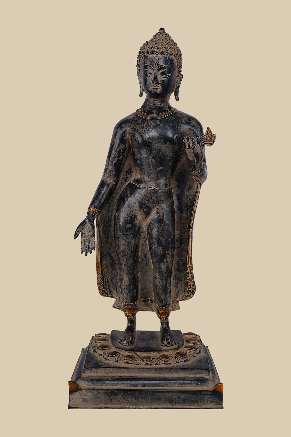 Brass statue of Lord Buddha standing with one hand raised in the Abhaya mudra (gesture of fearlessness and protection), wearing draped robes and standing on a carved lotus base.