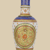 Elegant white marble vase hand-painted in a Mughal-inspired design with intricate floral patterns in red, green, and blue, accented with gold detailing and small embedded stones.