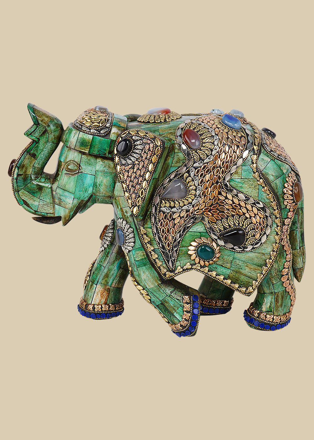 Regal green camel bone elephant sculpture intricately decorated with gold-toned metalwork and colorful gemstone inlays, showcasing traditional Indian craftsmanship
